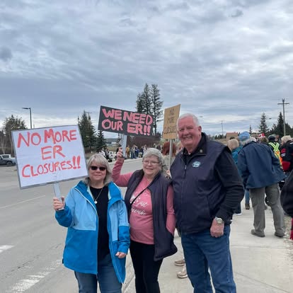 Community members at a rally against emergency room closures