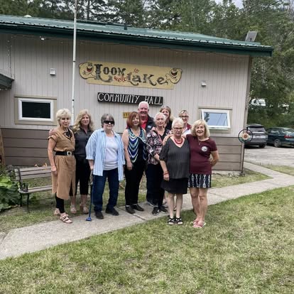Group outside Loon Lake Community Hall